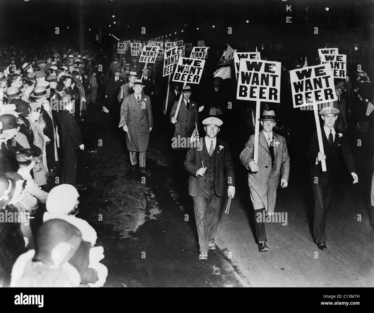 Labor union members protesting Prohibition in Newark New Jersey carrying signs reading 'We want beer.' October 1931. Stock Photo