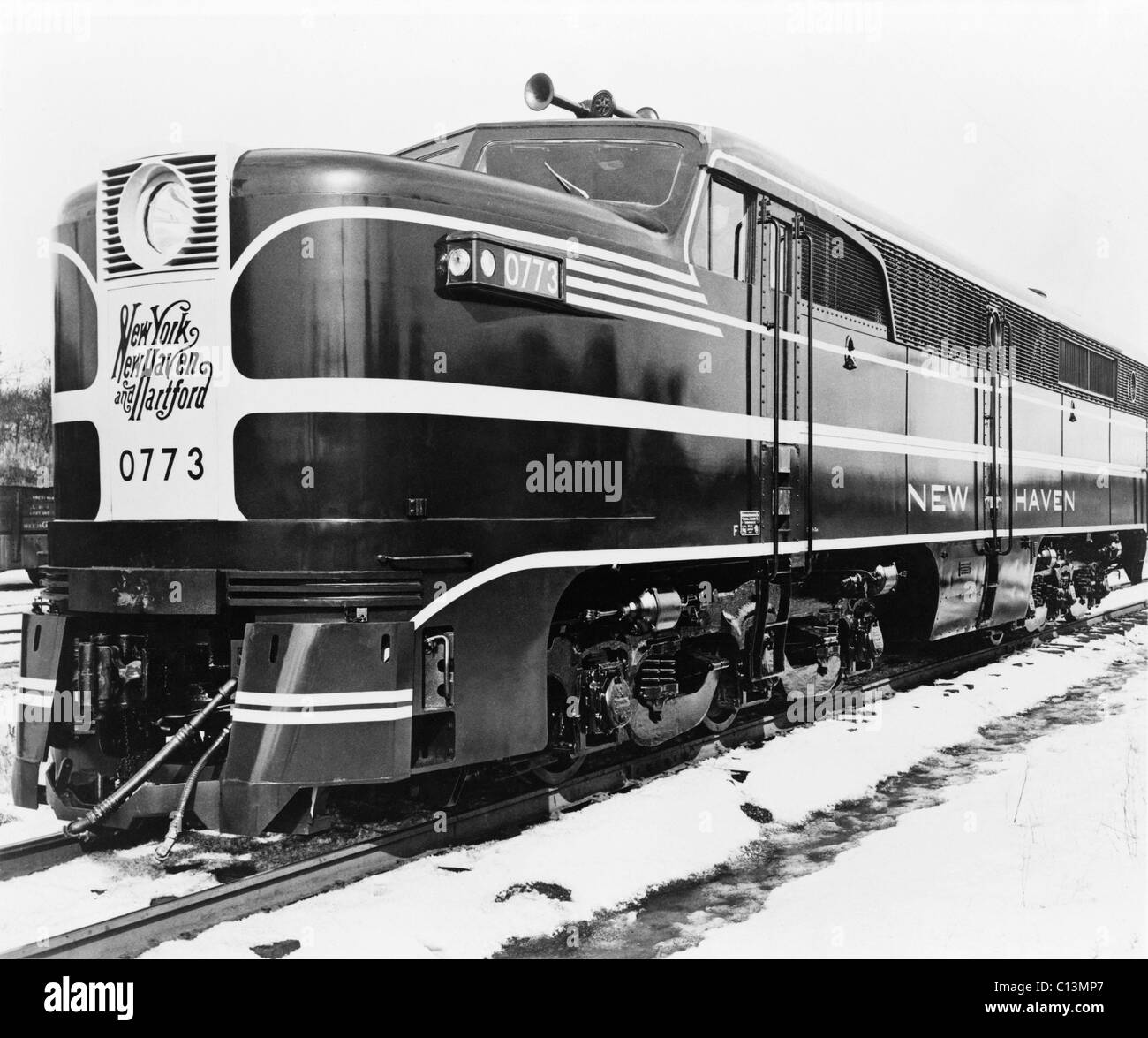 Diesel engines replaced coal powered steam locomotives in the mid-20th century. This hybrid diesel-electric engine ran on electric power within urban areas and switched to petroleum powered internal combustion when on conventional train tracks. LC-USZ62-104169 Stock Photo