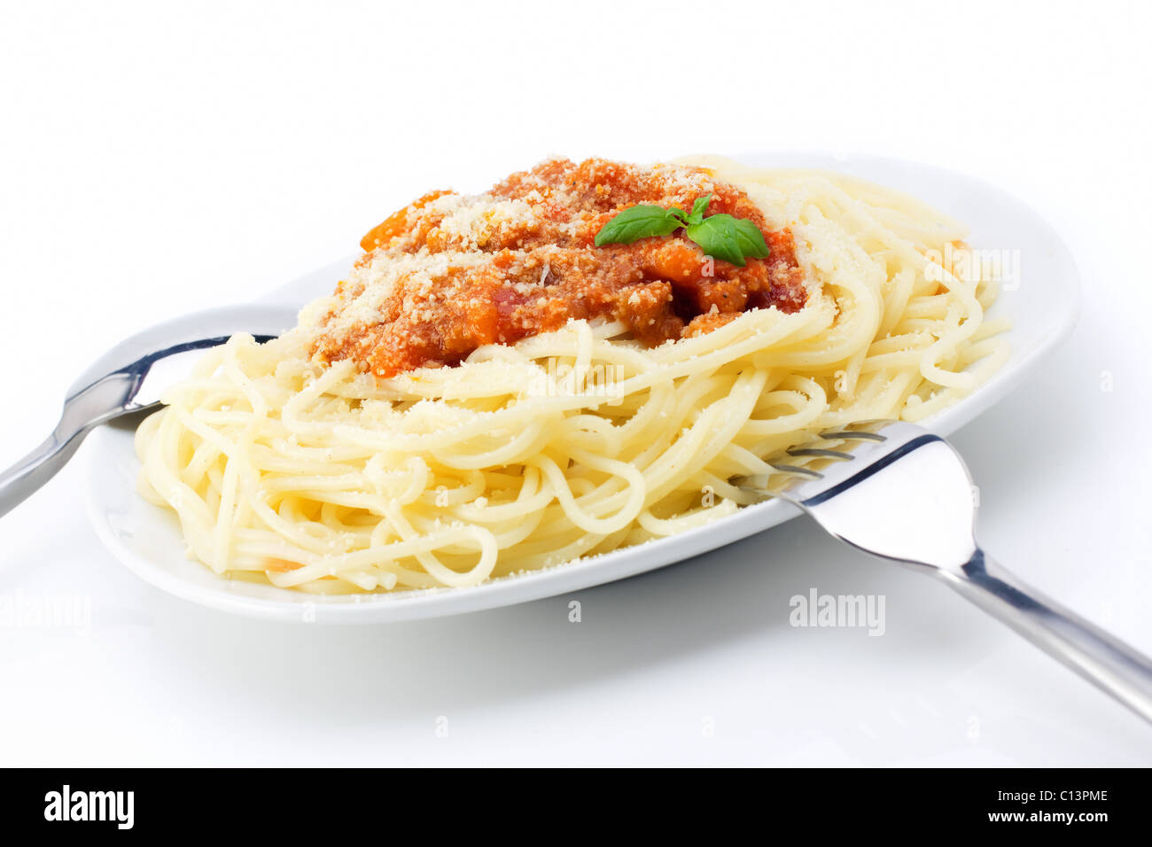 Spaghetti bolognese with parmesan cheese and basil Stock Photo