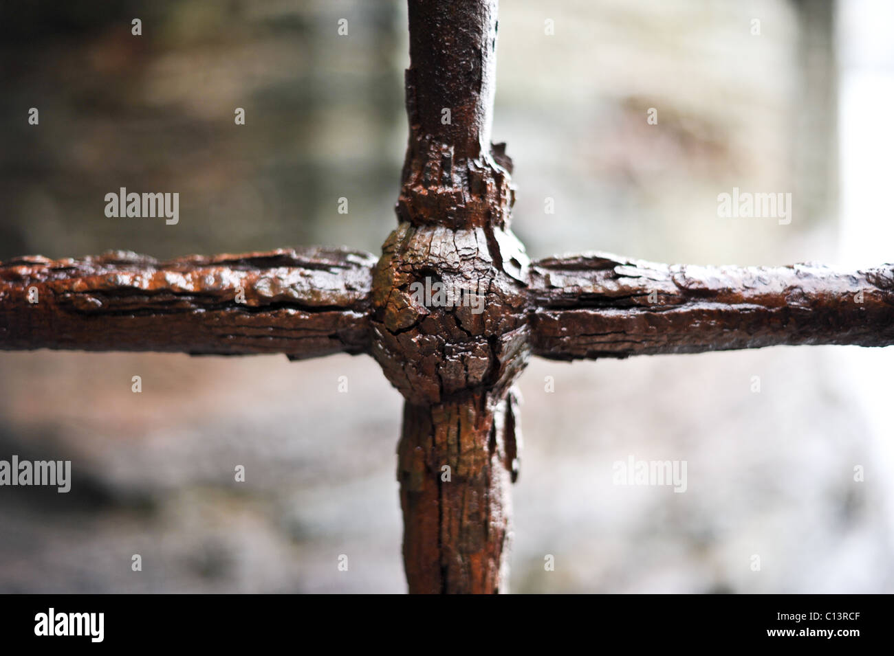 Corroded rusty iron cross Stock Photo