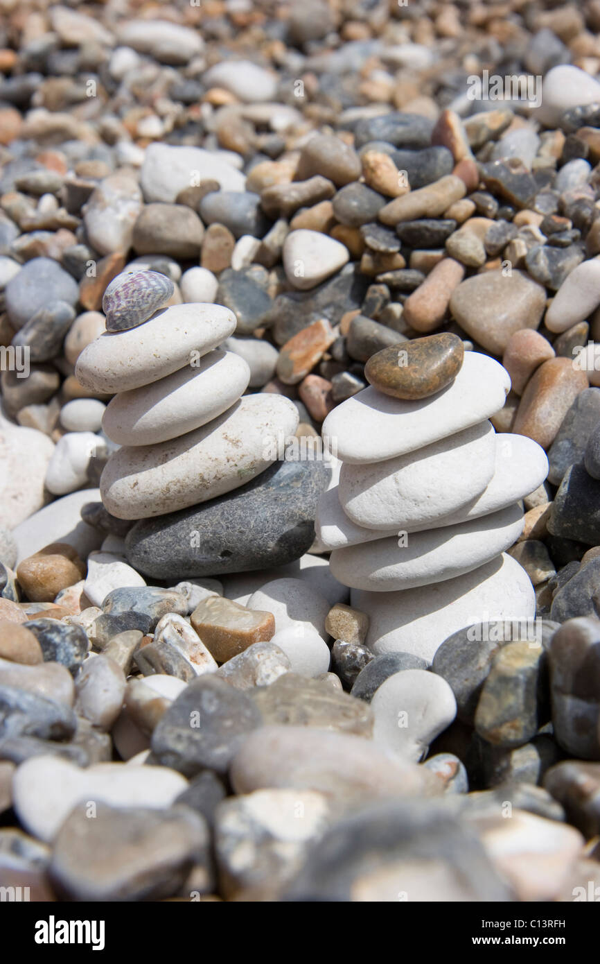 white rounded chalk pebbles on a beach in Dorset, England Stock Photo