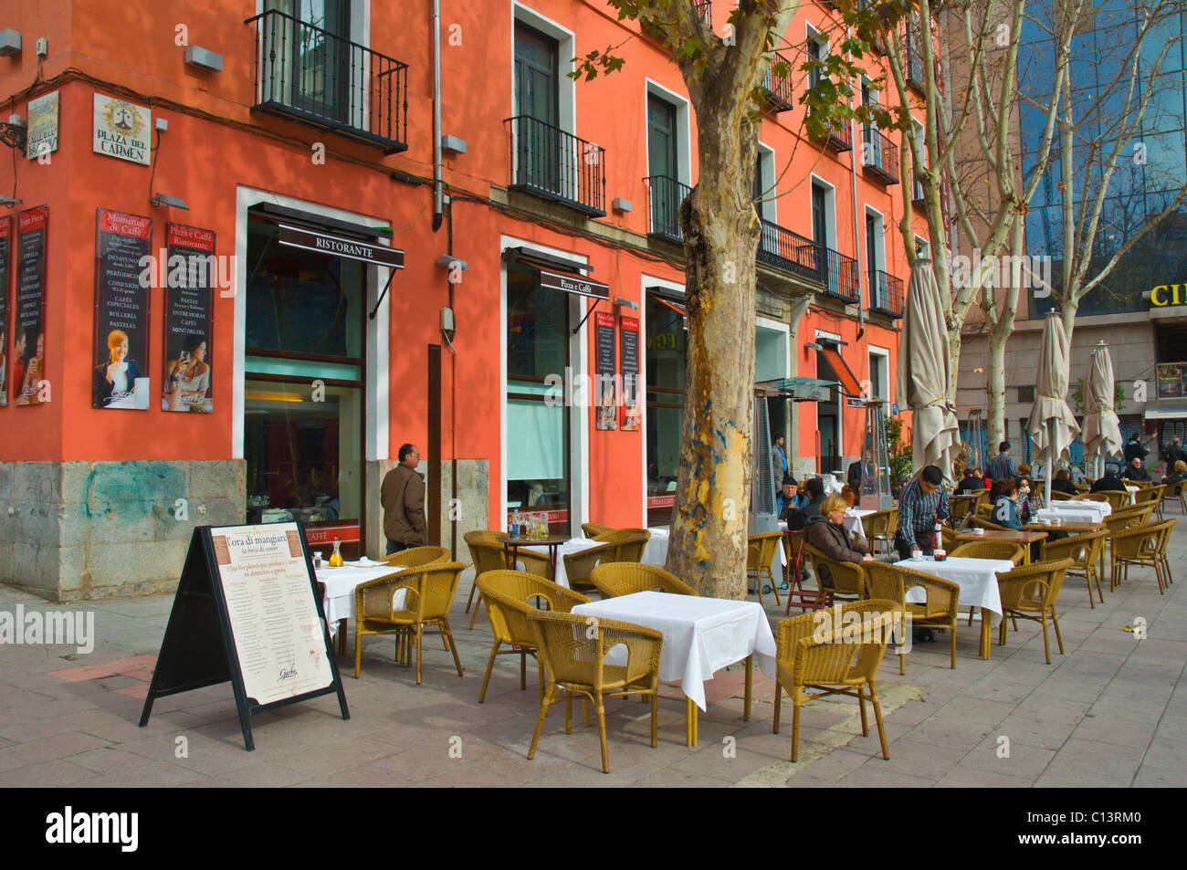 Cafe and restaurant tables at Plaza del Carmen square central Madrid Spain Europe Stock Photo