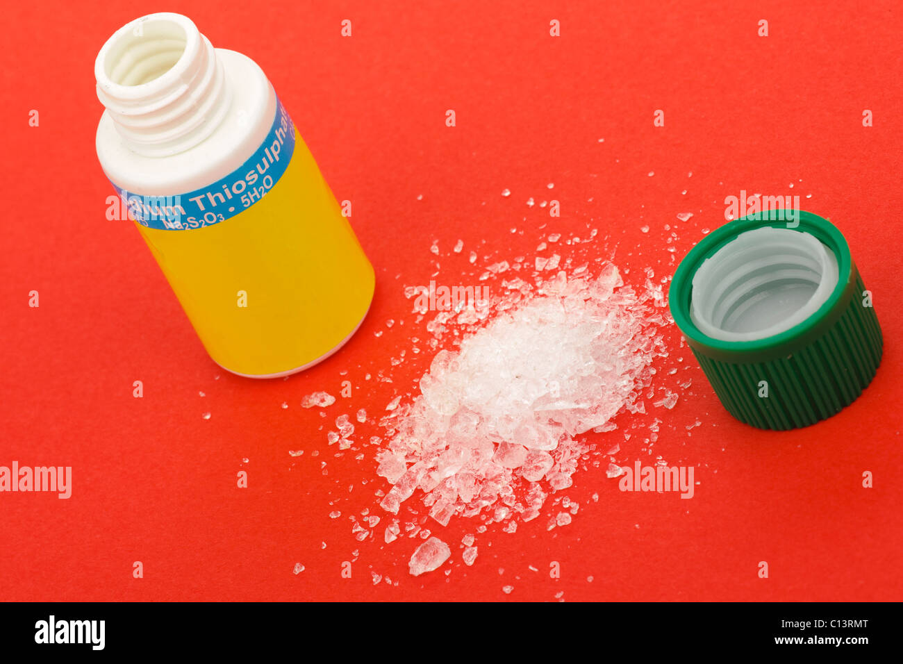 Opened plastic container of Sodium Thiosulphate Stock Photo