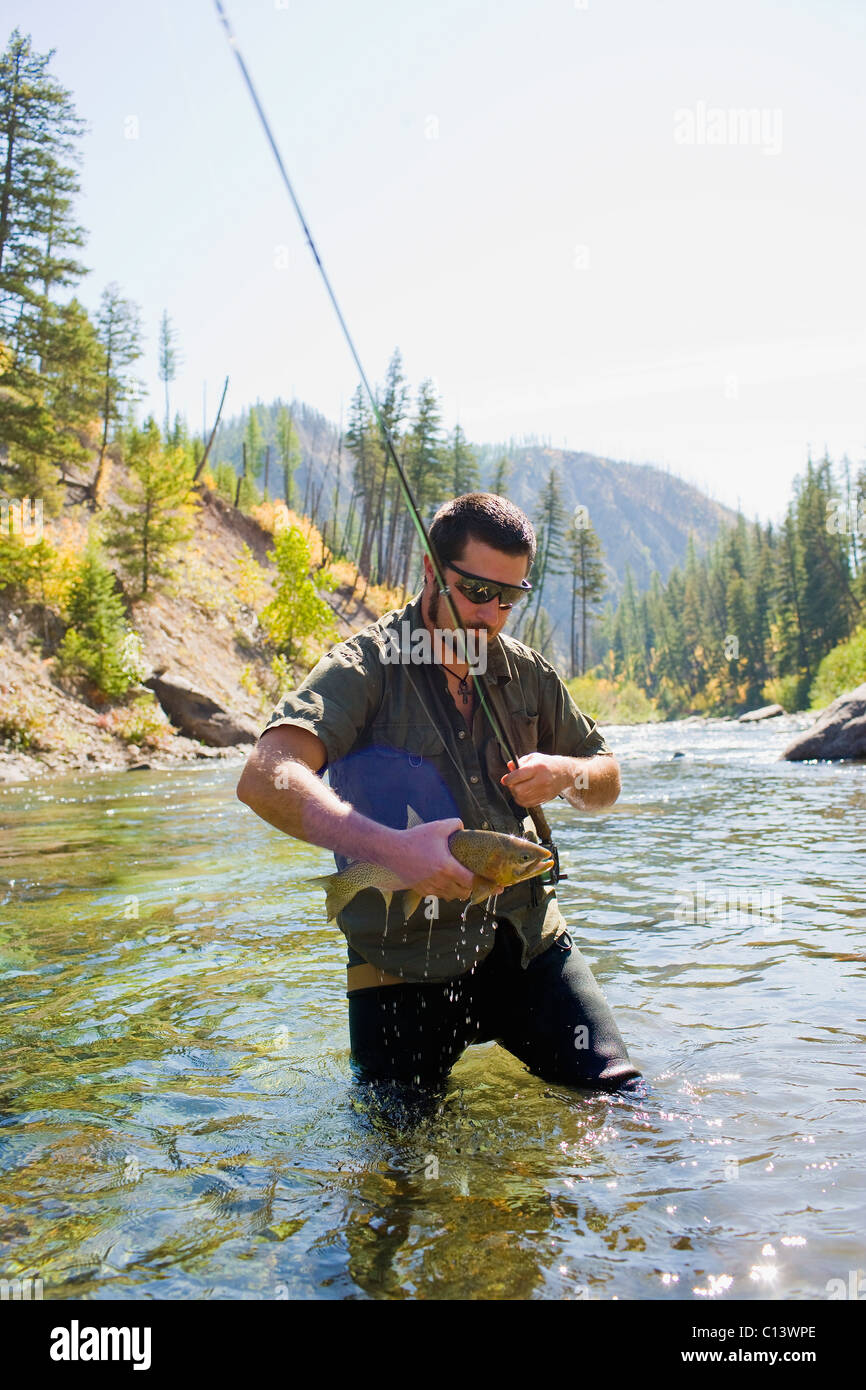 USA, Montana, Man fly fishing in North Fork of Blackfoot River Stock