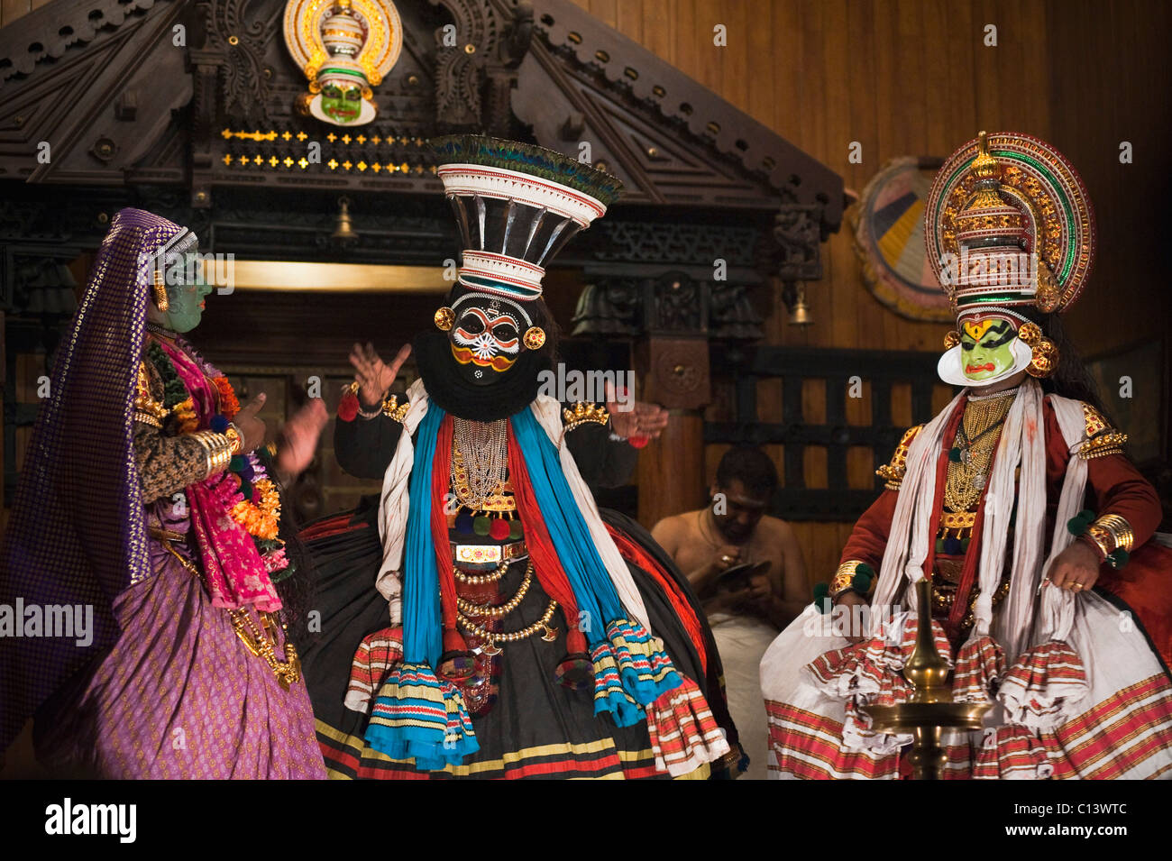 Three people performing Kathakali dance, Kochi, Kerala, India Stock Photo