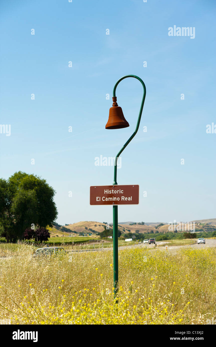 Historic El Camino Real sign and bell-shaped marker along California Highway One near Paso Robles, California. Stock Photo