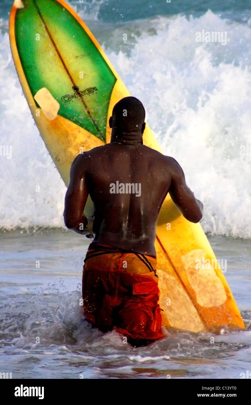 Surfer off the Silver Sands Coast off Barbados Stock Photo