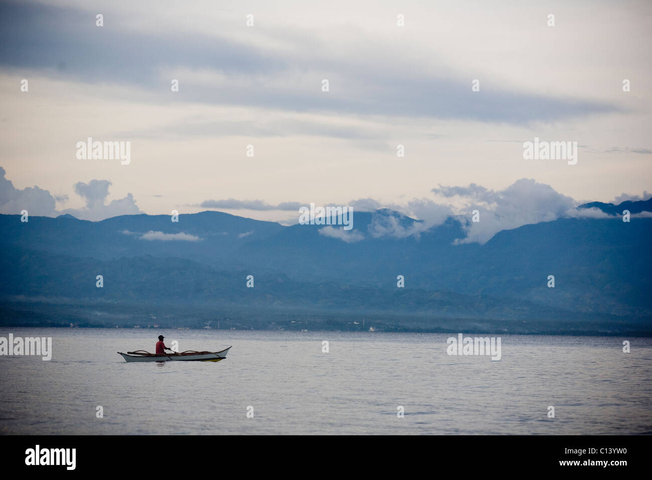 Small rowing boat in South China Sea Stock Photo