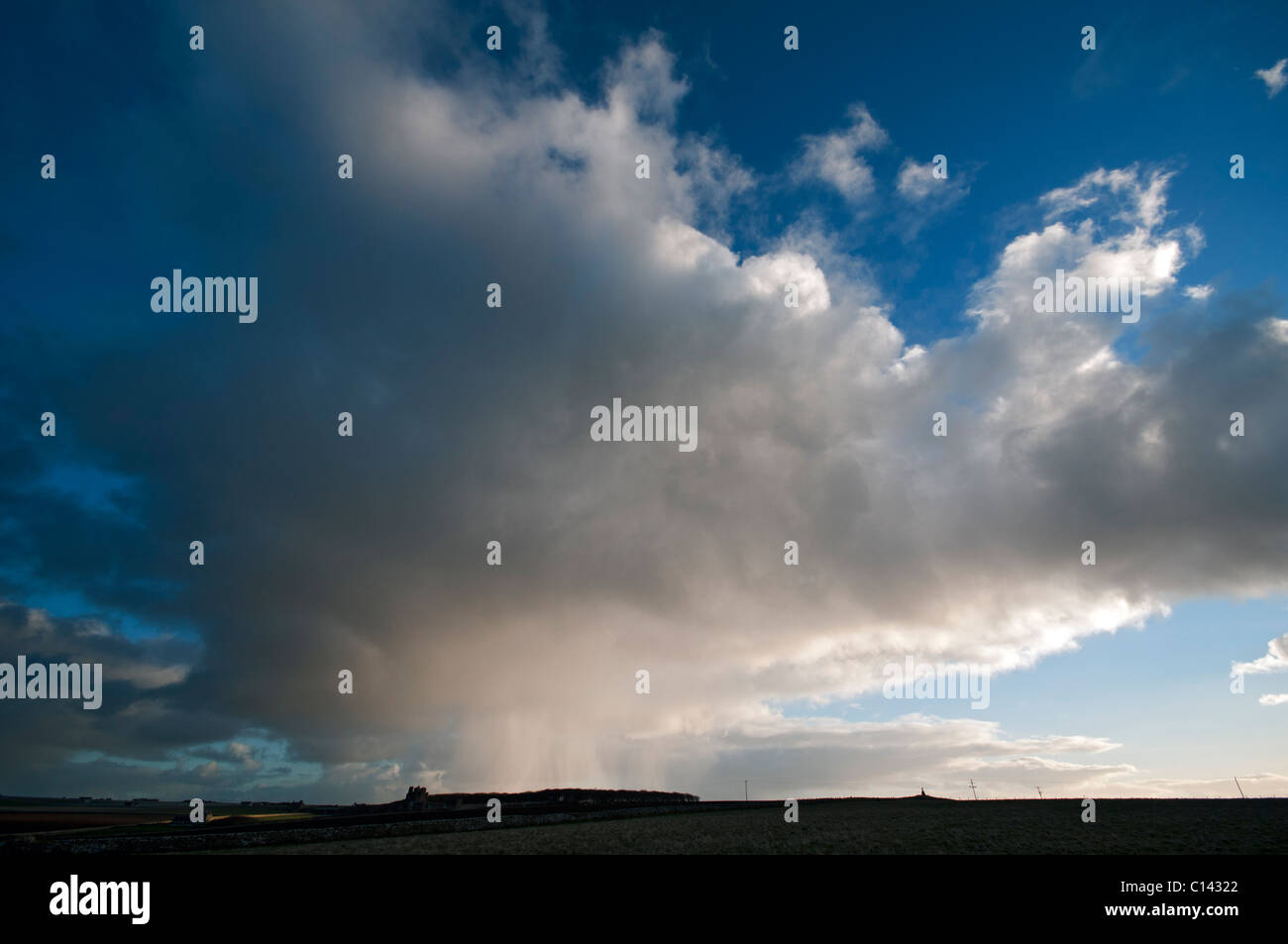 Shower cloud over the Castle of Mey, Caithness, Scotland, UK Stock Photo