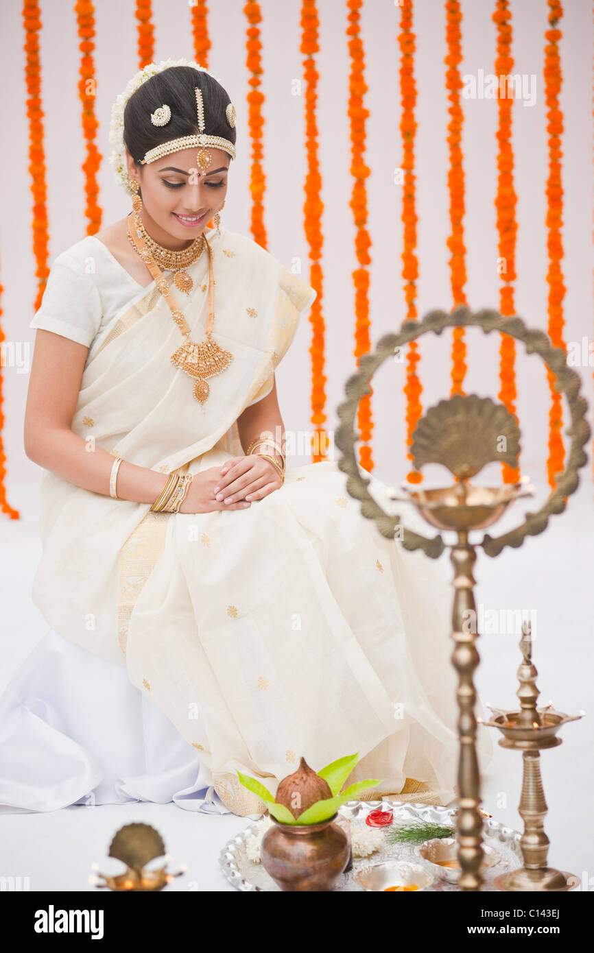 Bride in traditional South Indian dress smiling Stock Photo