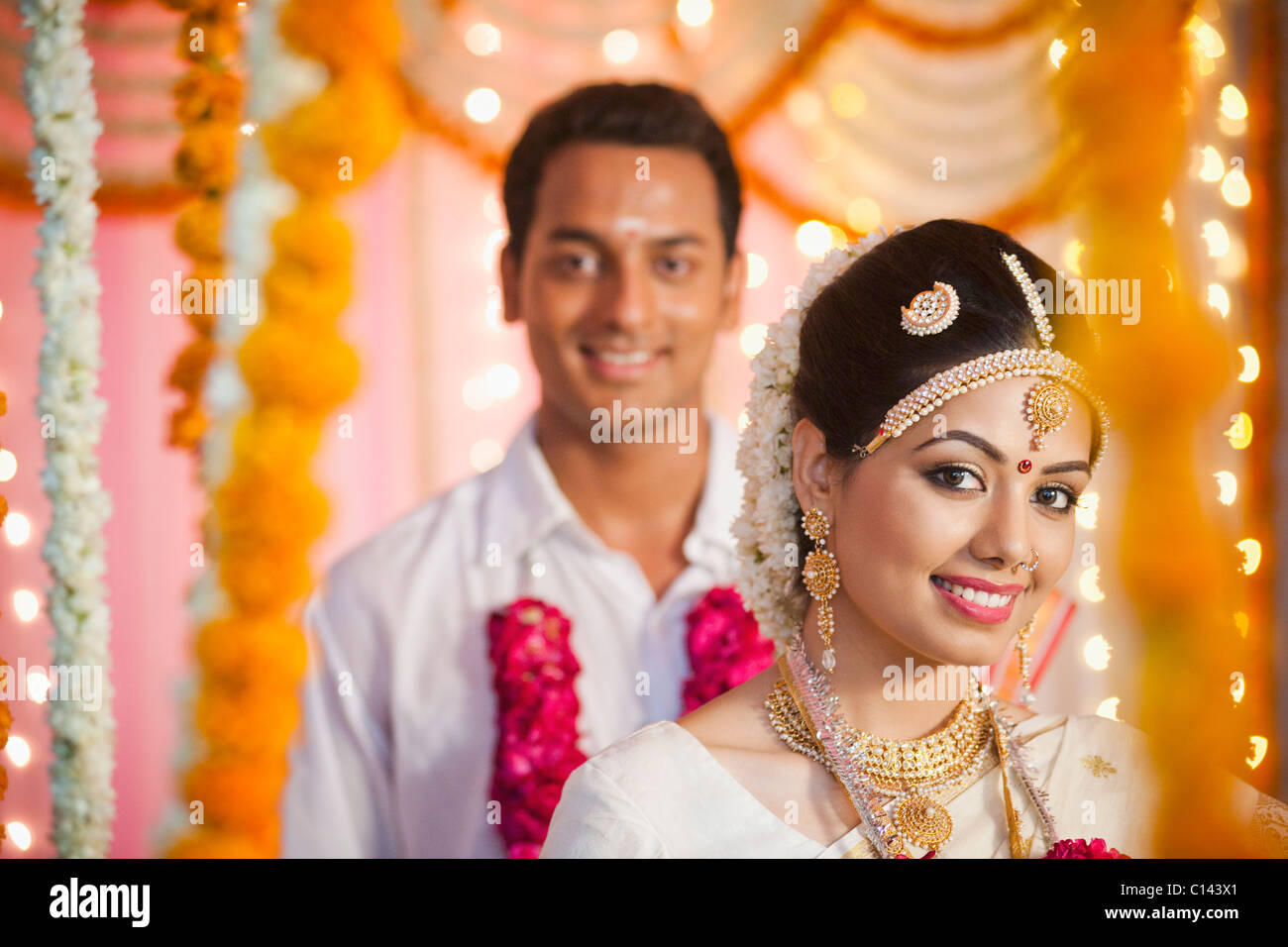 Portrait of a newlywed couple smiling Stock Photo - Alamy