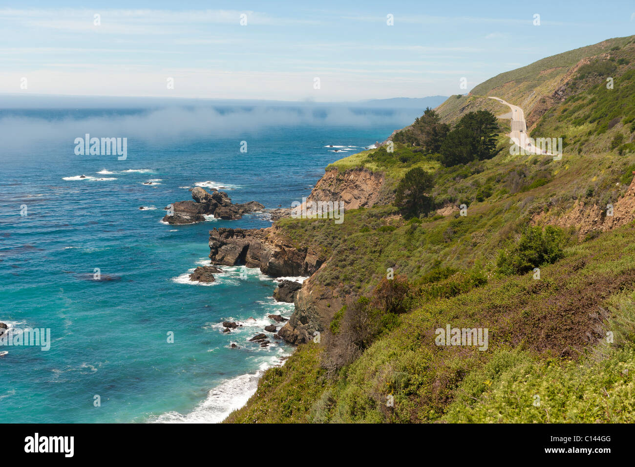 California Highway 1 winds along the Big Sur coastline with view of the ...