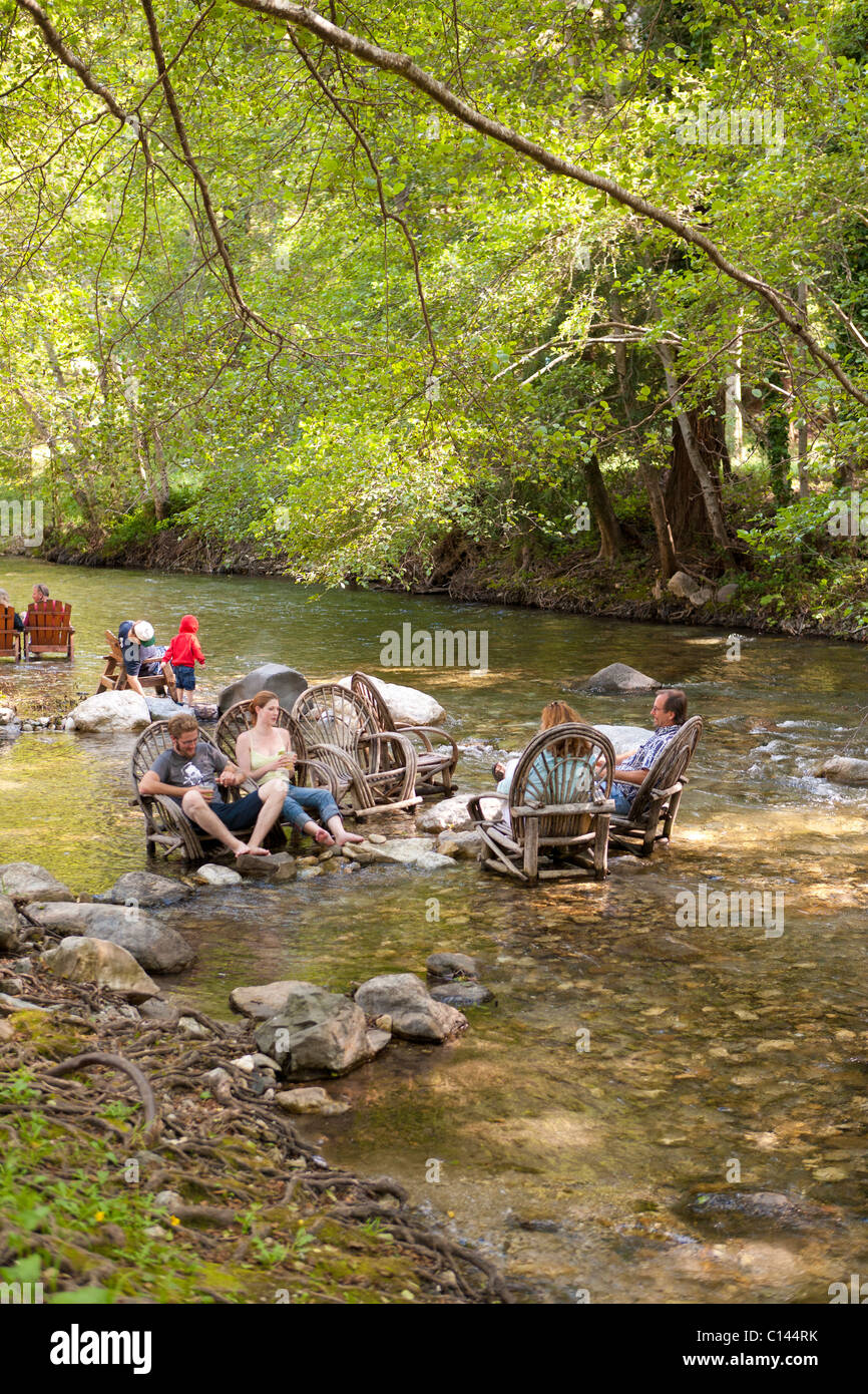 Big Sur Inn; chairs in Big Sur River (seemed to be used by non-guests as well). Big Sur, California Stock Photo