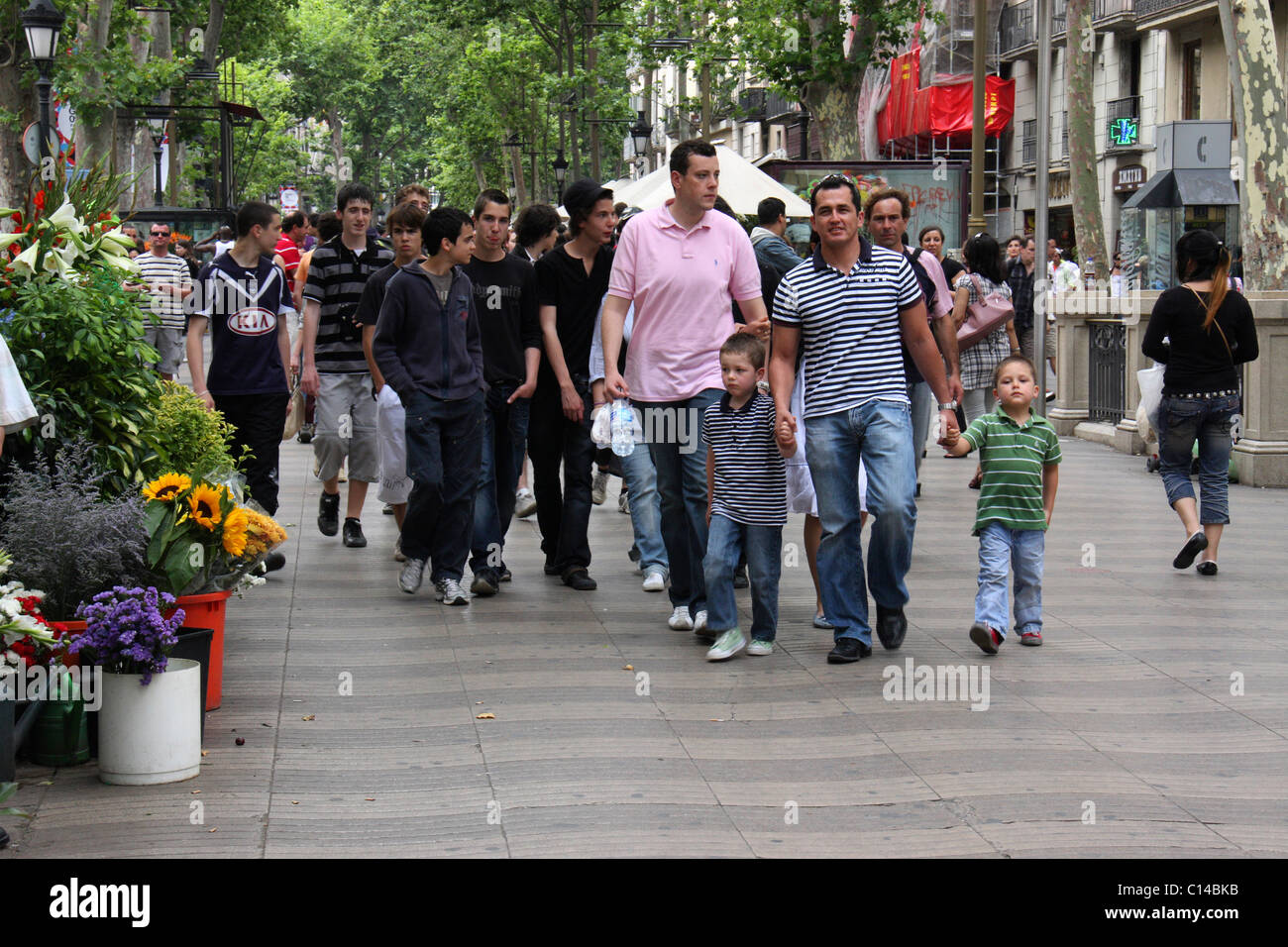 tourists infront of flower shop in la rambla street,barcelona,spain,europe Stock Photo