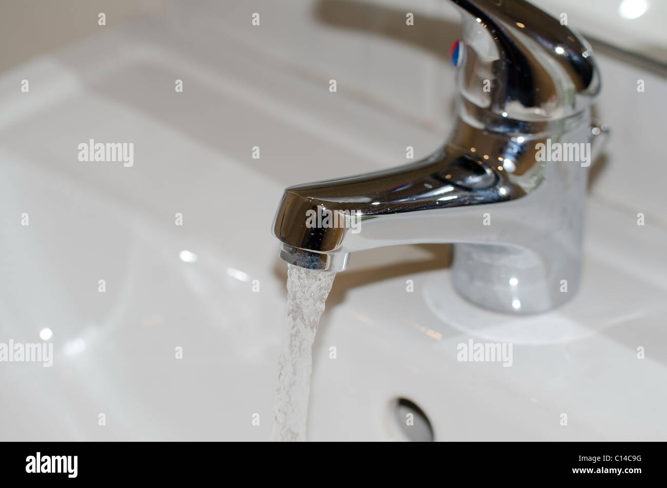 Running hot water, sink tap Stock Photo Alamy