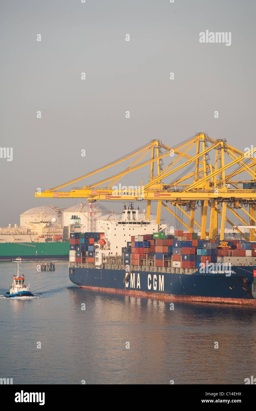 Spanish Container Ship Early morning at Barcelona Harbour.Container ship discharging cargo ...