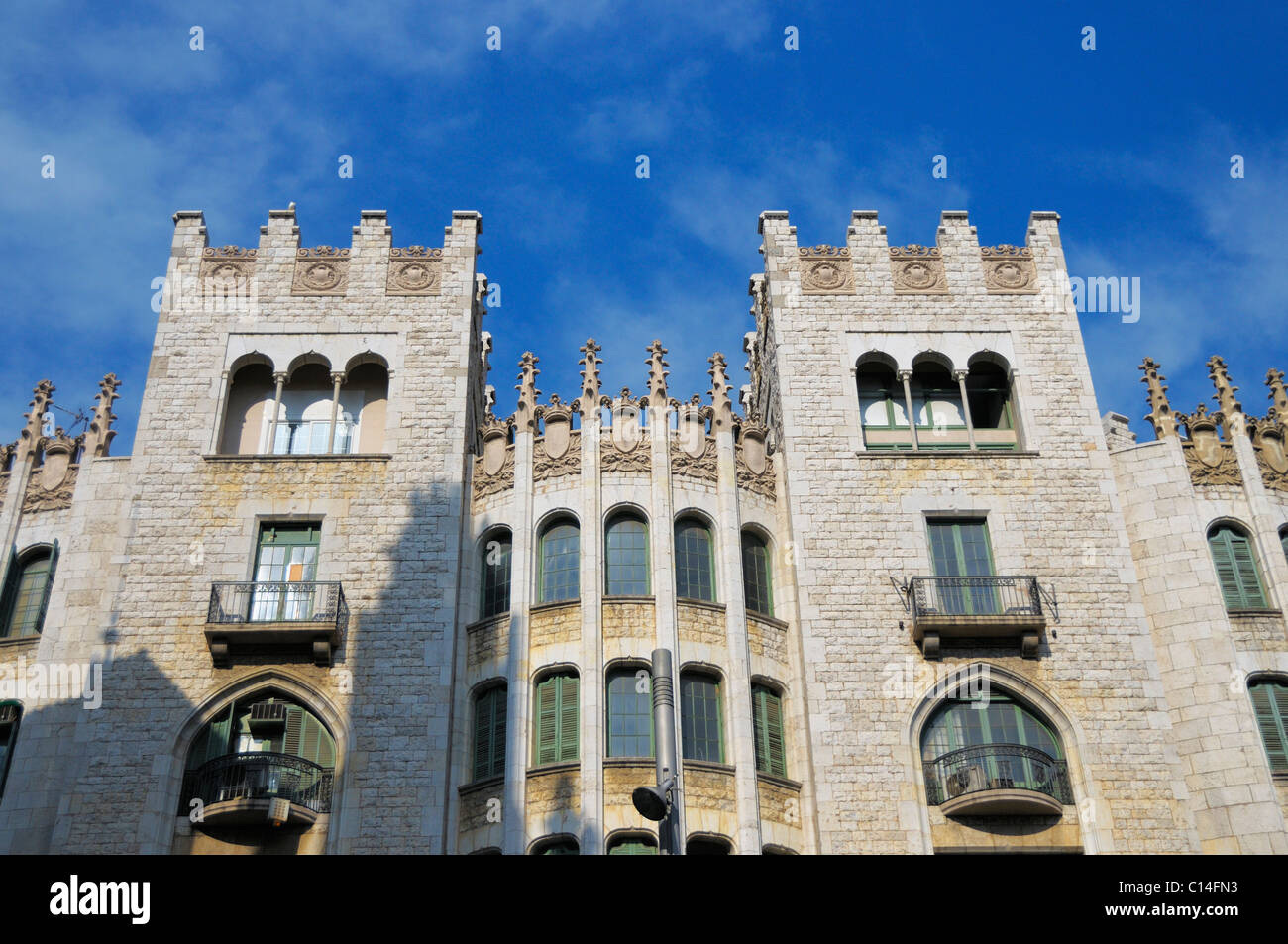 Castle like building on Via Laietana just around the corner of the Palacio de la Música Catalana in Barcelona, Spain. Stock Photo