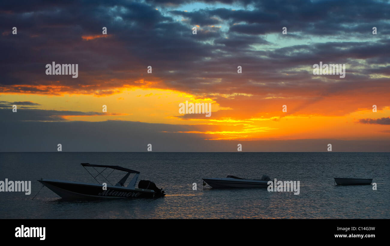 Sunset view onto the beach of the Hotel La Mariposa in La Preneuse, Black River, Mauritius. Stock Photo