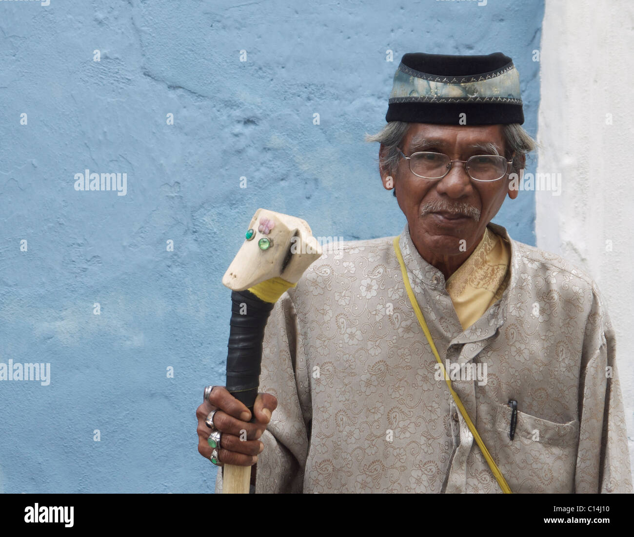 Man with staff Stock Photo - Alamy