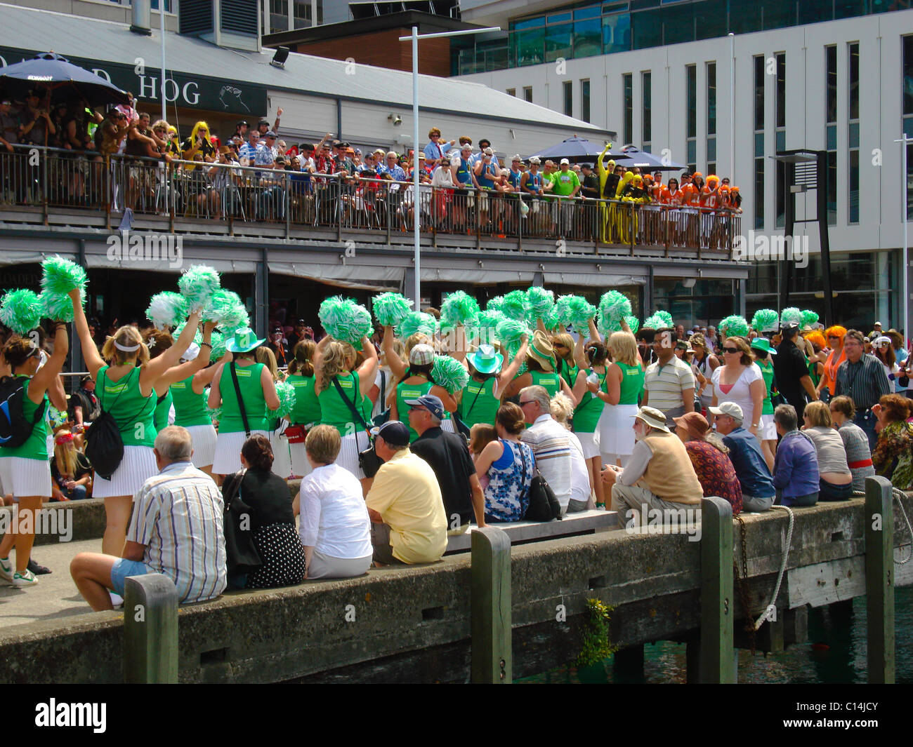 Crowds in costume parade along the waterfrong, NZI Sevens, Wellington, New Zealand Stock Photo