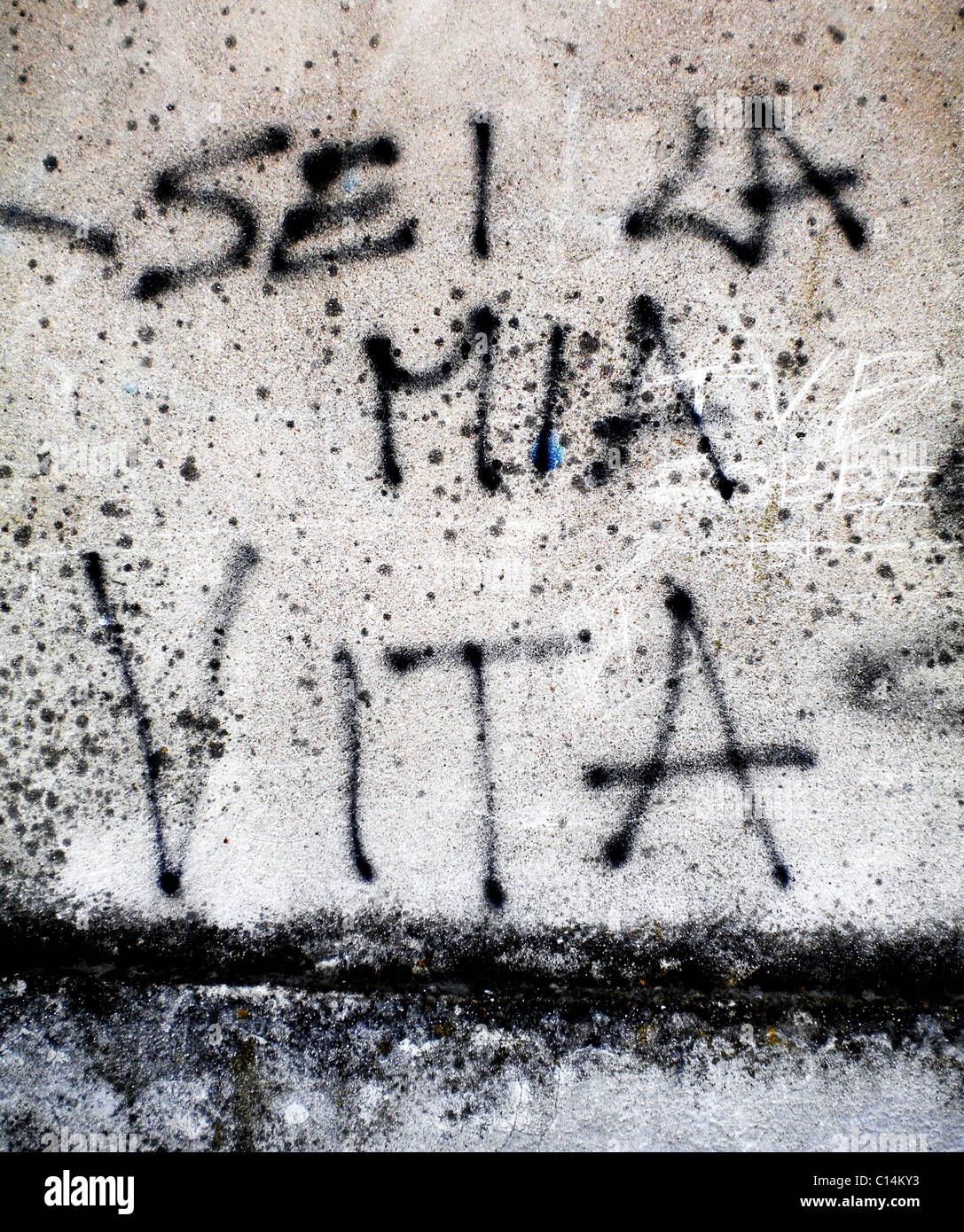 Spray graffiti on concrete walls Stock Photo Alamy