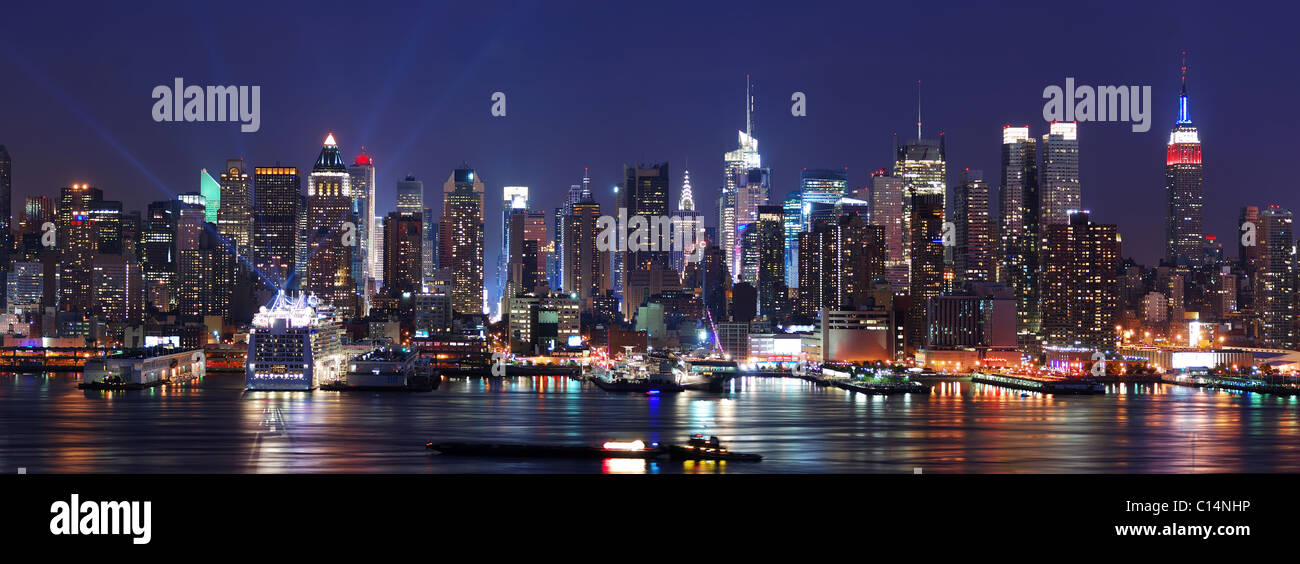 New York City Manhattan skyline panorama at night over Hudson River ...