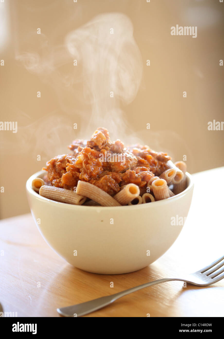 Rigatoni pasta with pork ragu Stock Photo Alamy