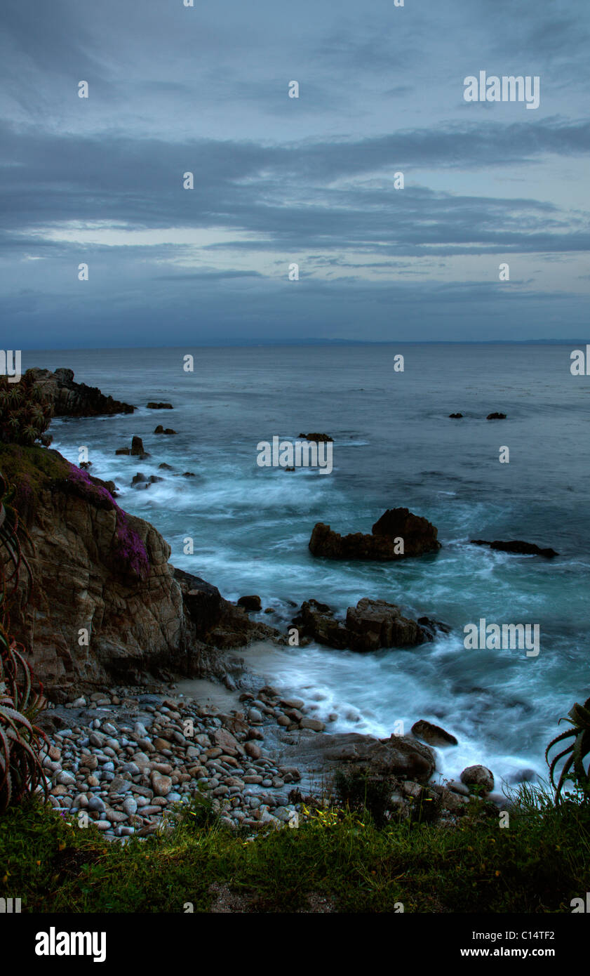 Waves crasing into rock coastline near Pacific Grove, Monterey Bay, Central California, USA Stock Photo