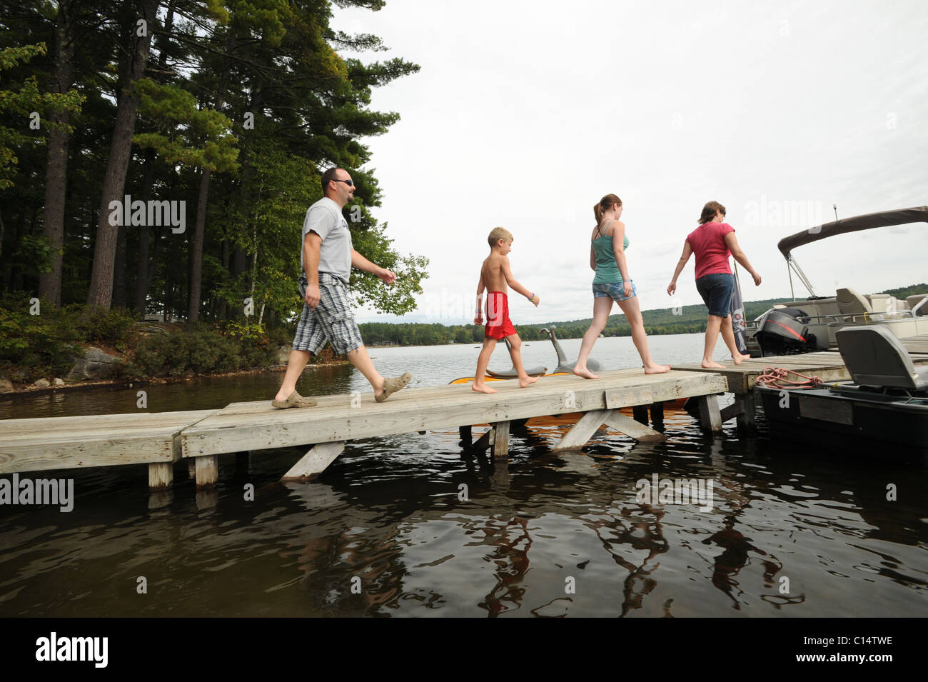 Maine Camp Life. Campers enjoy a day at Crystal Lake near Harrison
