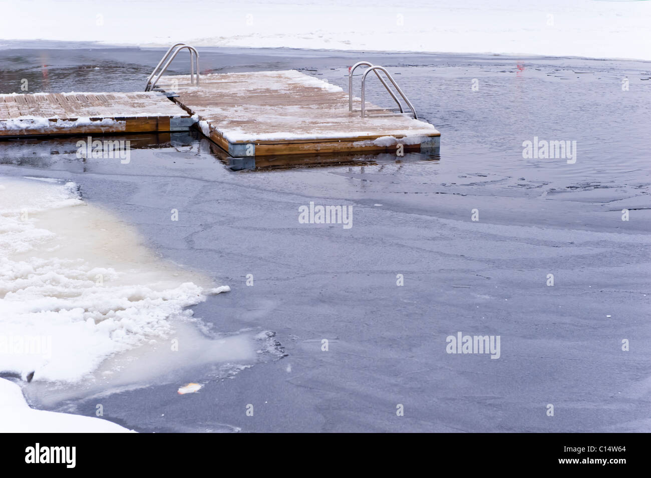 Jetty used by swimmers during winter, Sweden Stock Photo