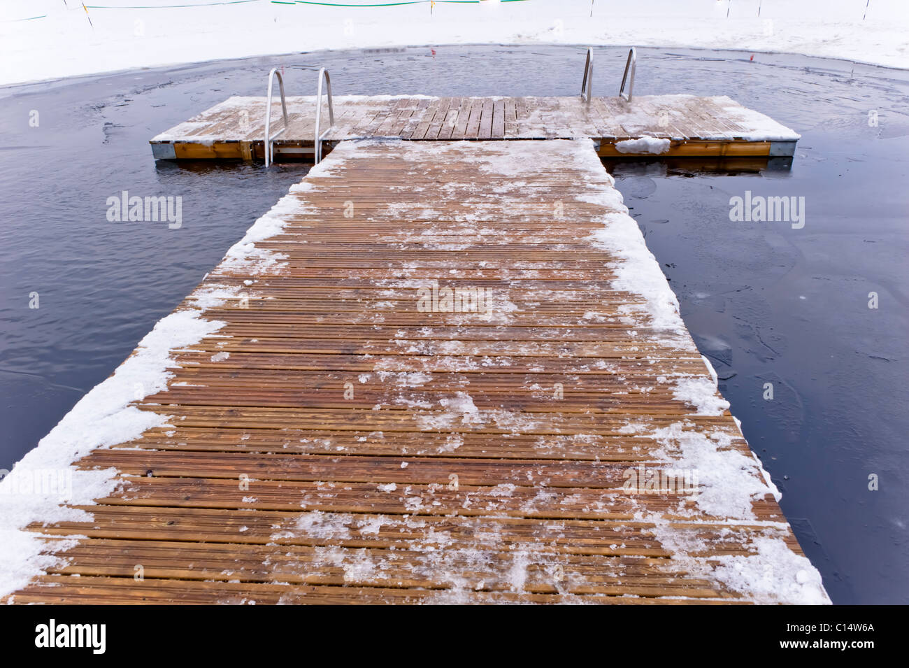 Jetty used by swimmers during winter, Sweden Stock Photo