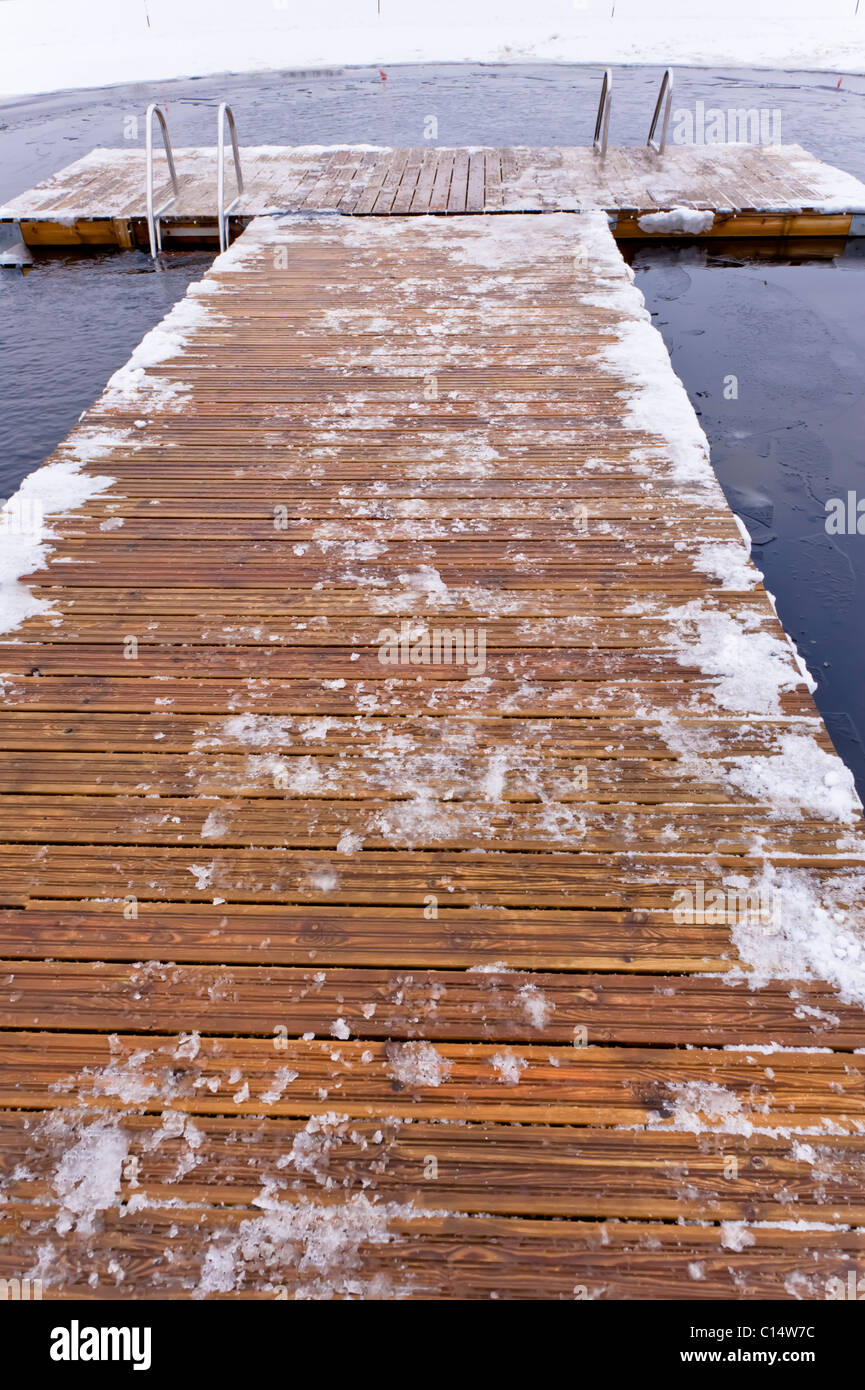Jetty used by swimmers during winter, Sweden Stock Photo