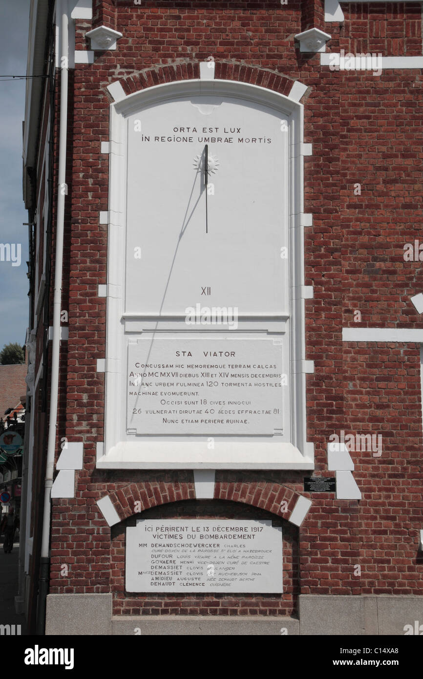 A sun dial on the side of a building in the pretty French village of Hazebrouck, Nord-Pas-de-Calais, France. Stock Photo
