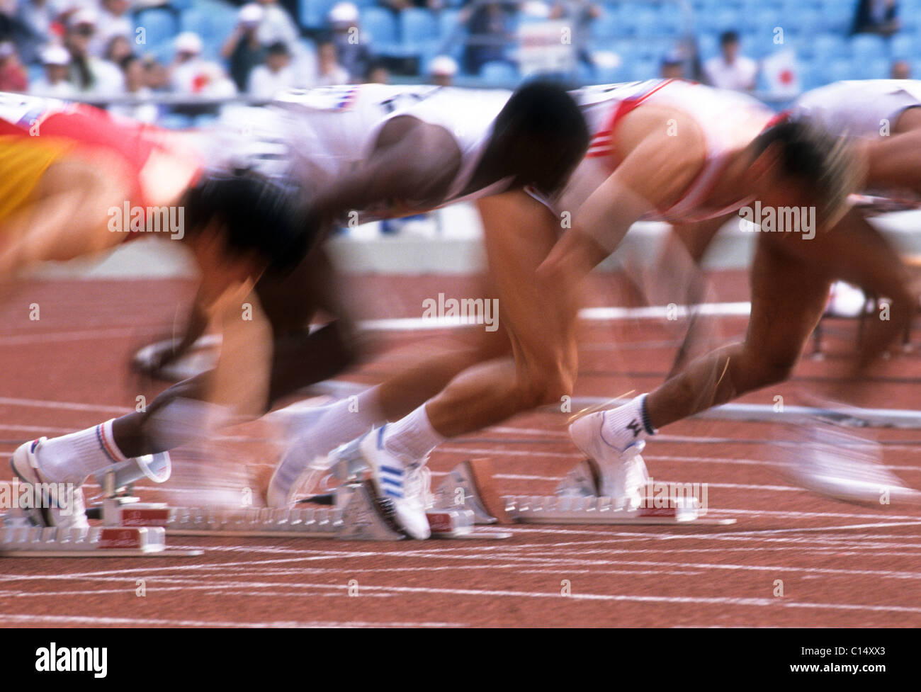 Blurred action of men's 100 meter sprint race. Stock Photo