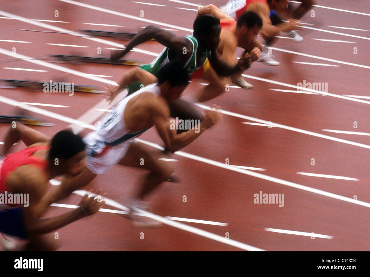 Blurred action of men's 100 meter sprint race. Stock Photo