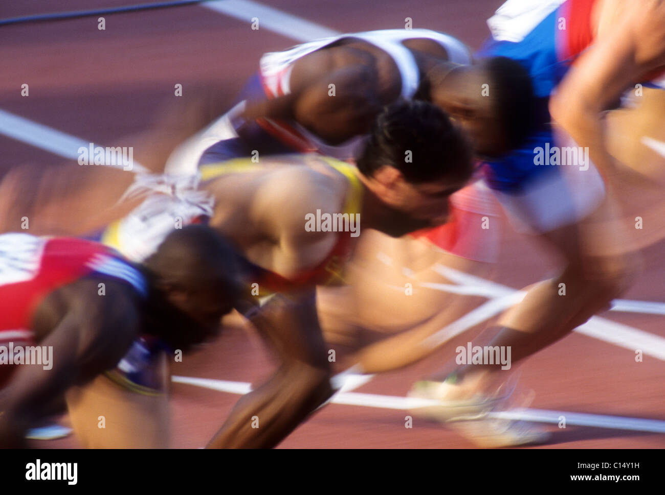 Blurred action of men's 100 meter sprint race. Stock Photo