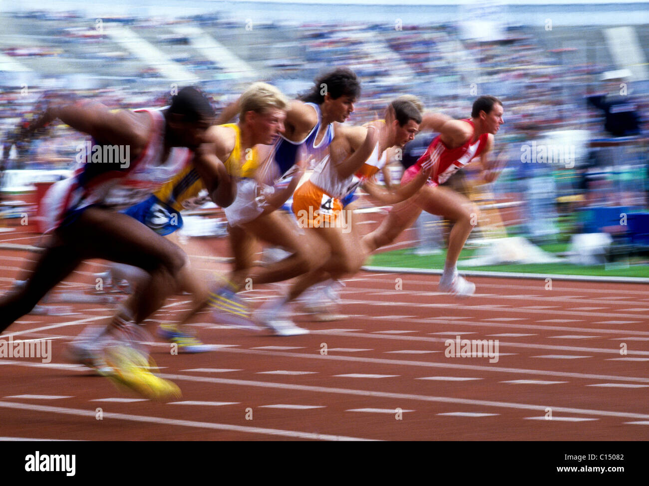 Blurred action of men's 100 meter sprint race. Stock Photo