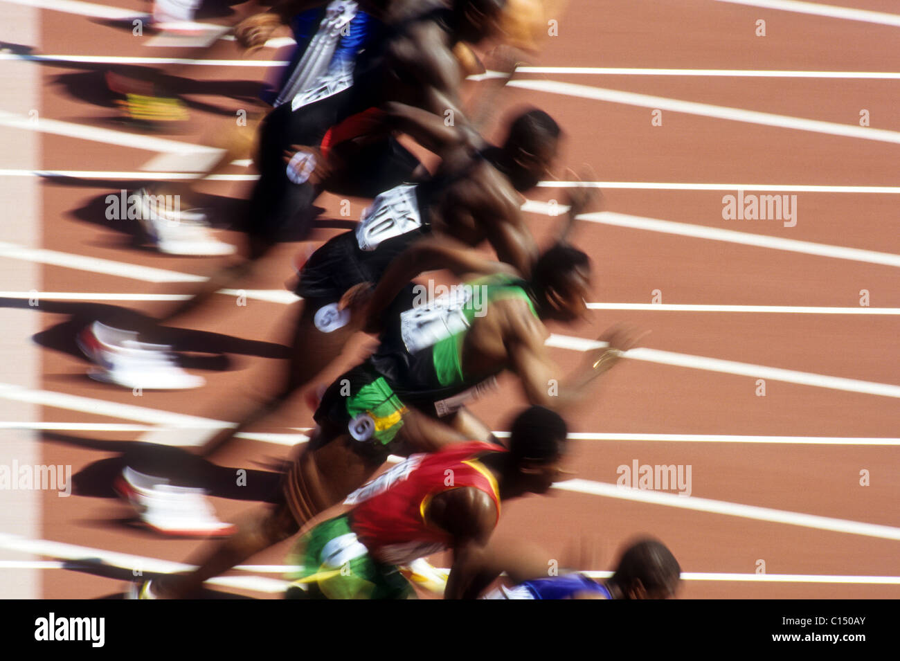 Blurred action of men's 100 meter sprint race. Stock Photo