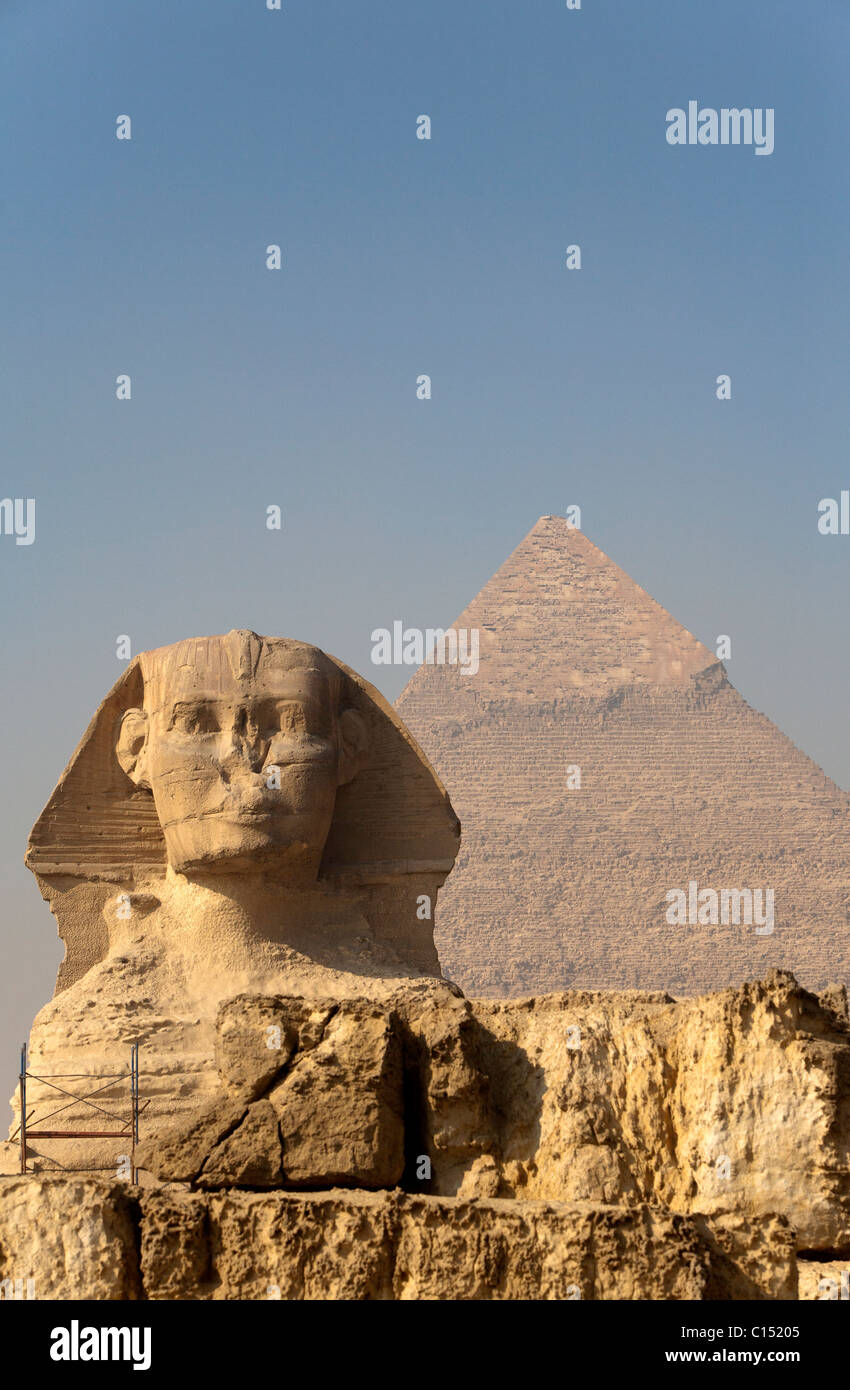 The morning smoke clears to view both the Sphinx and the Pyramid of Khafre (Chephren) in Giza, Egypt Stock Photo