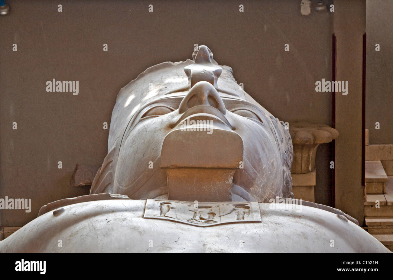 Pharaoh Ramses II remains stone cold and very still in the recline position in Memphis, Egypt. Stock Photo