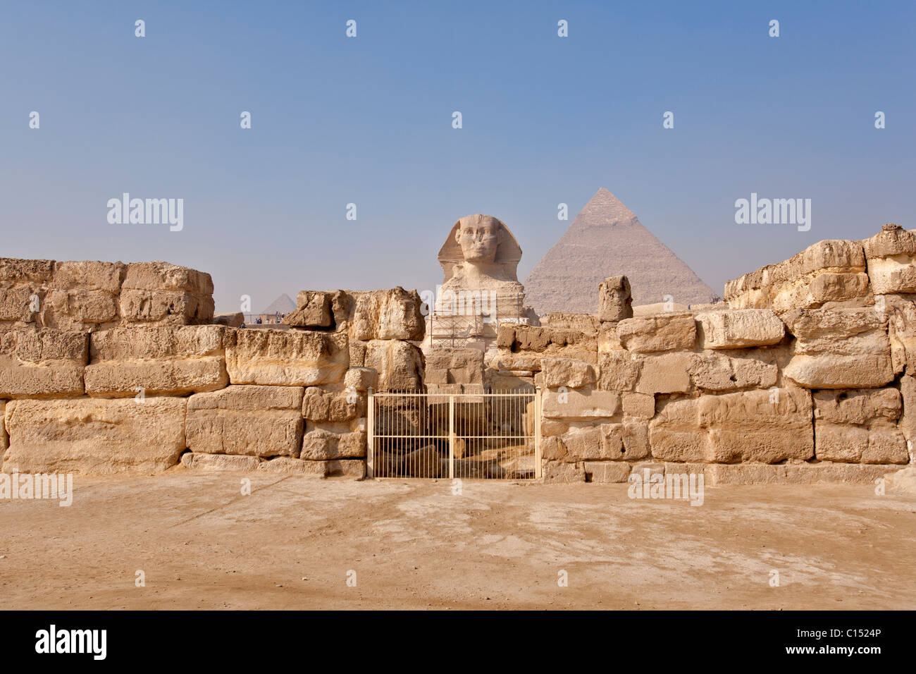 The morning smoke clears to view both the Sphinx and the Pyramid of Khafre (Chephren) in Giza, Egypt Stock Photo