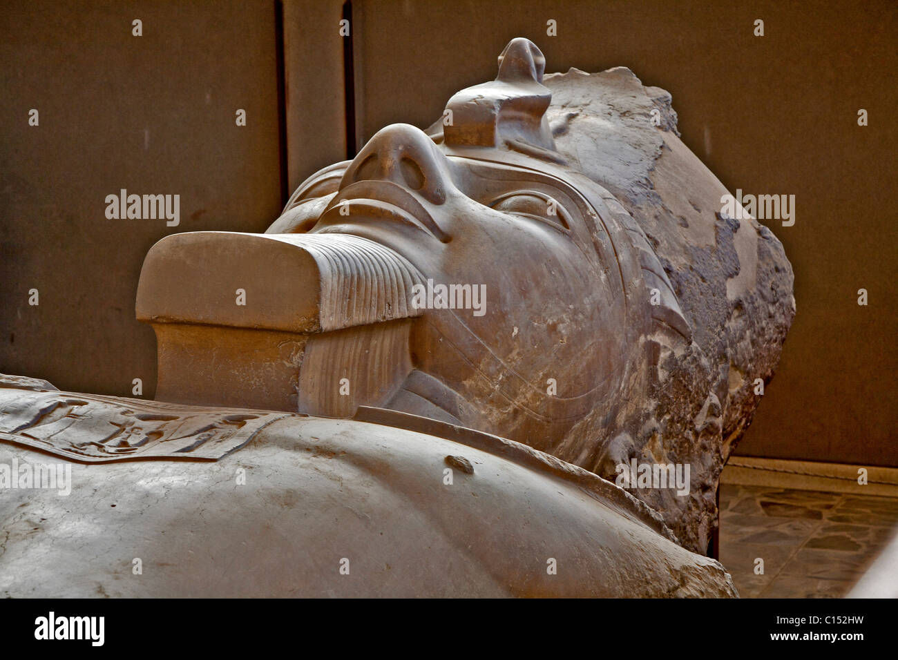 Pharaoh Ramses II remains stone cold and very still in the recline position in Memphis, Egypt Stock Photo