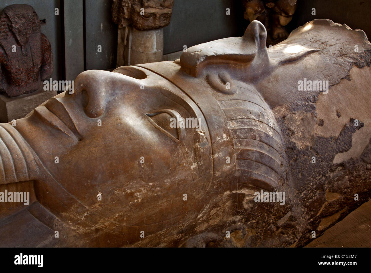 Pharaoh Ramses II remains stone cold and very still in the recline position in Memphis, Egypt. Stock Photo