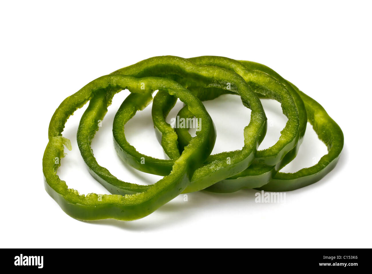 Sliced green pepper isolated on white background Stock Photo - Alamy