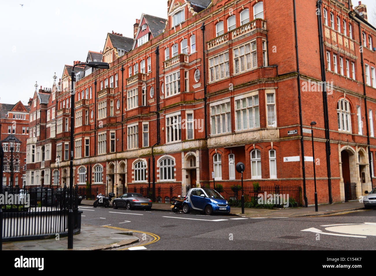 Homes of the Wealthy: Red Brick Houses near Cadogan Square, Knightsbridge Chelsea Area, London, United Kingdom. Stock Photo