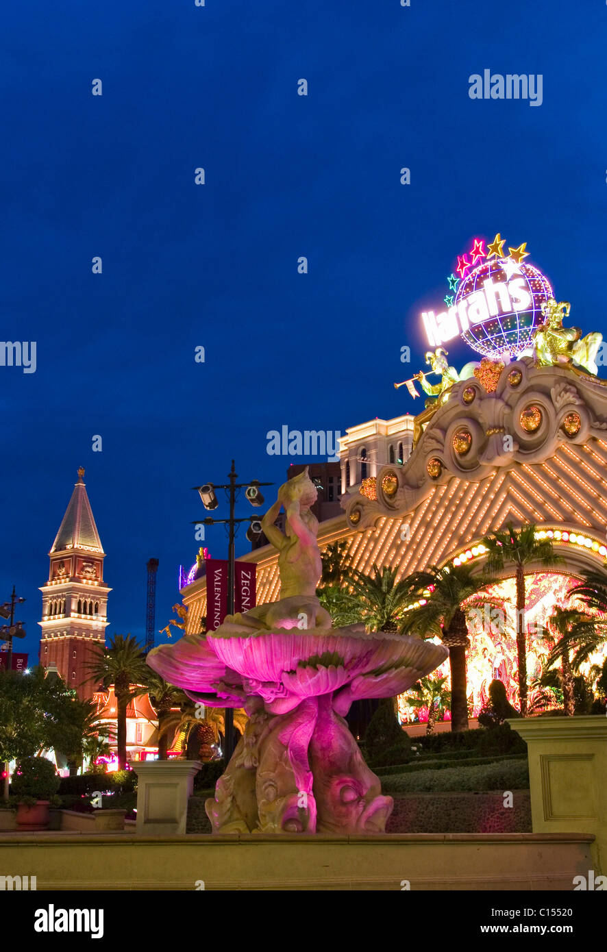 Harrahs and Hotel behind illuminated fountain Stock Photo Alamy