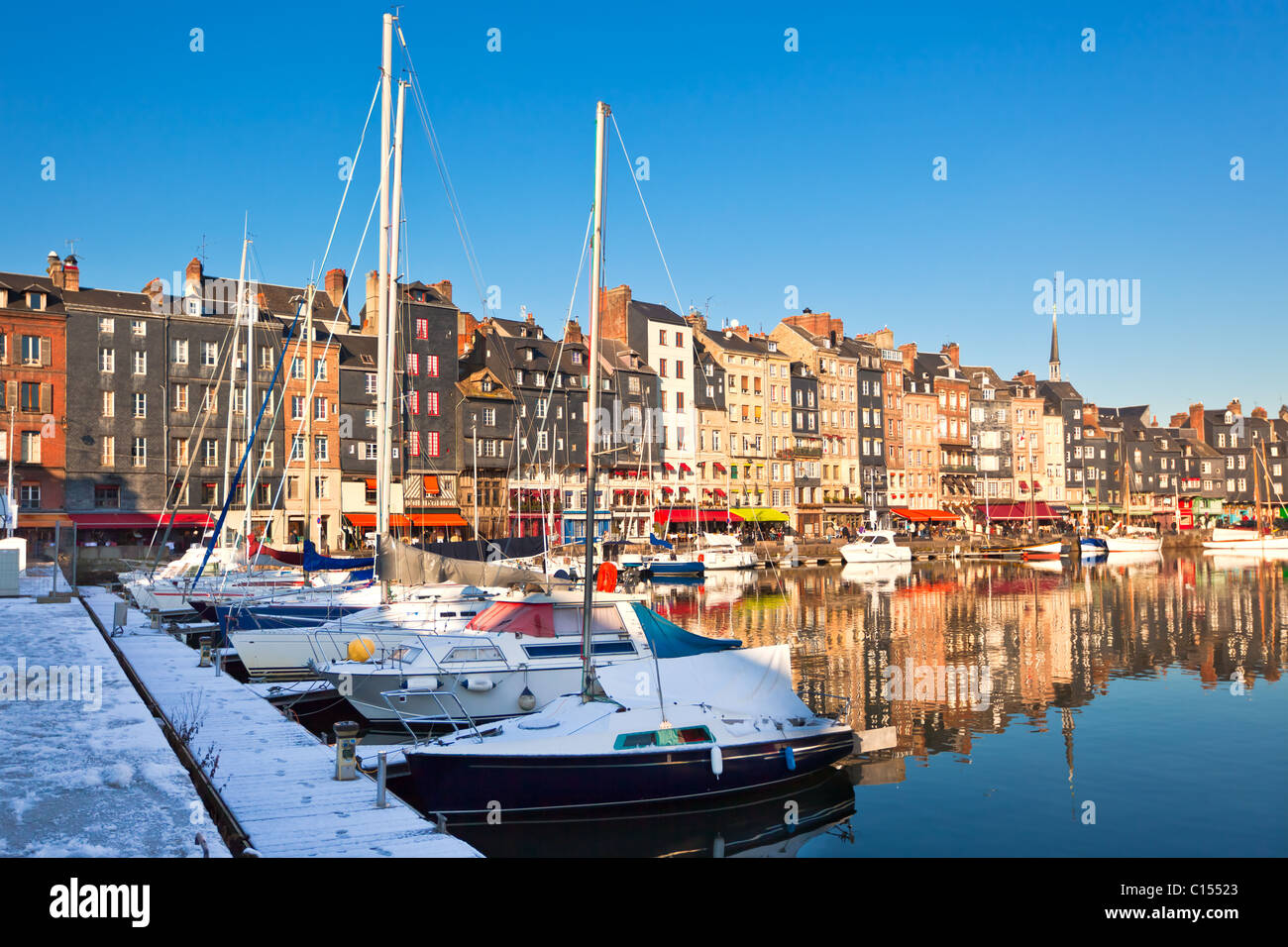 Honfleur harbour in Normandy, France. Color houses and their reflection ...