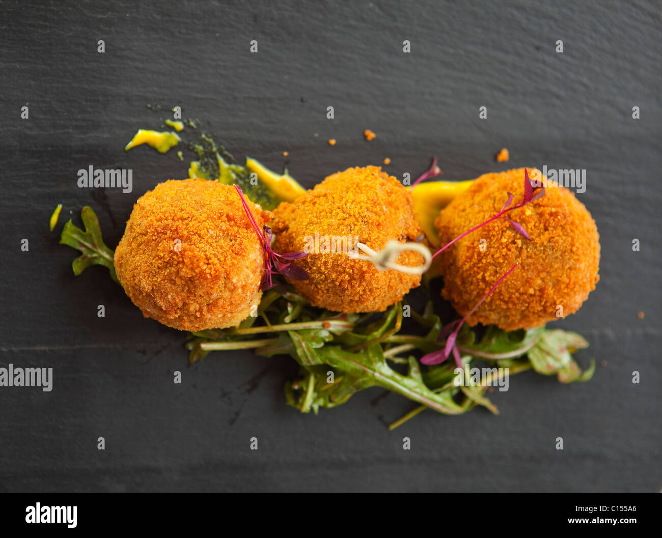 starter Deep fried "Pigs trotters Balls" with english mustard dressing