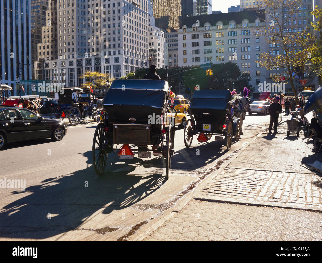 Carriages near Central Park in Manhattan awaiting hire. Stock Photo