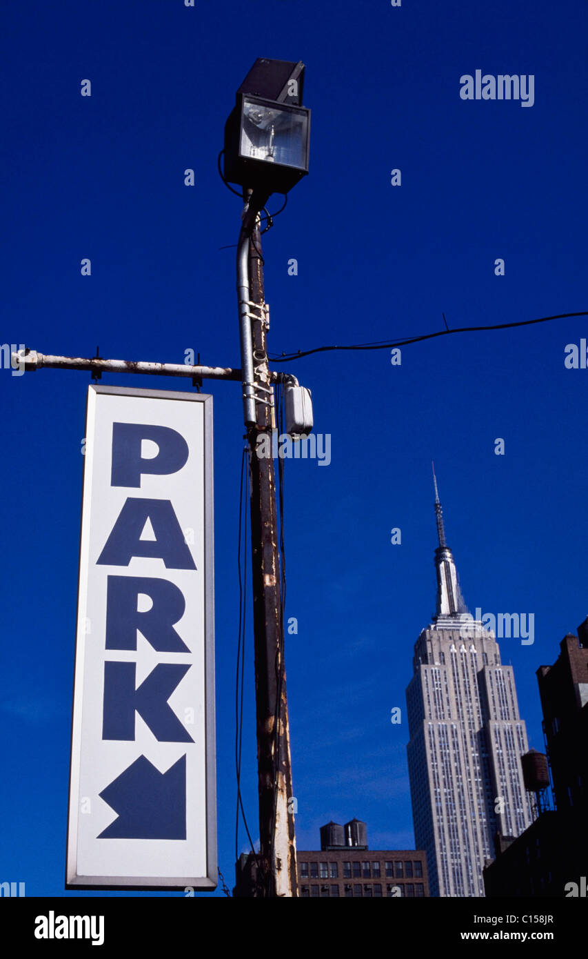 Empire State Building and car park sign Stock Photo